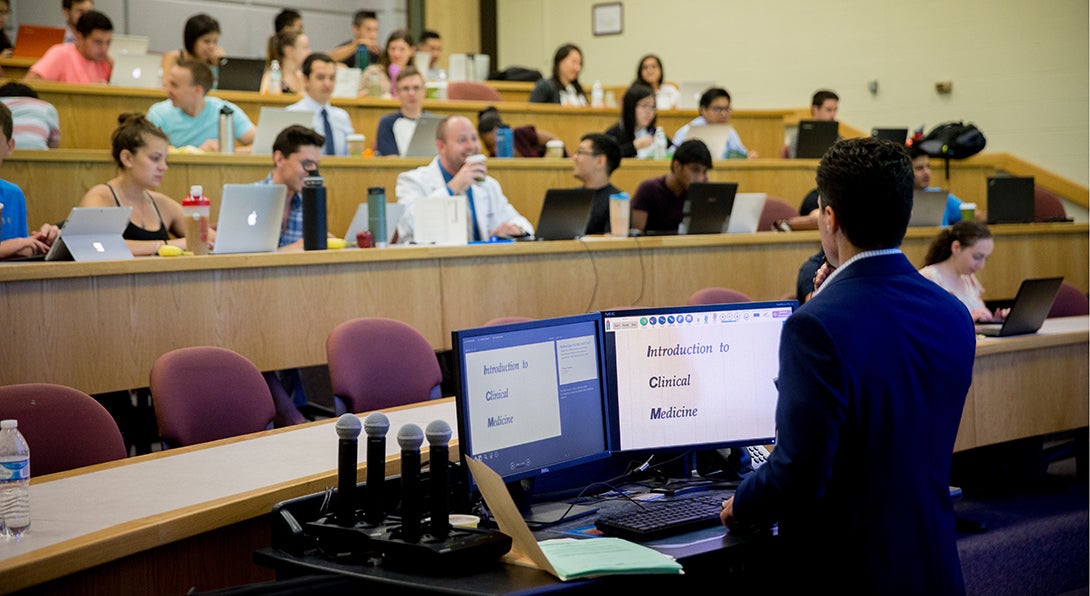 Dr. Jager addresses a class in a lecture hall