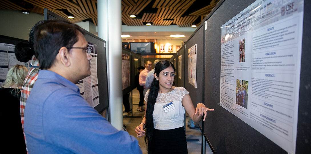 A Medical Student Presents Her Research During Research Day