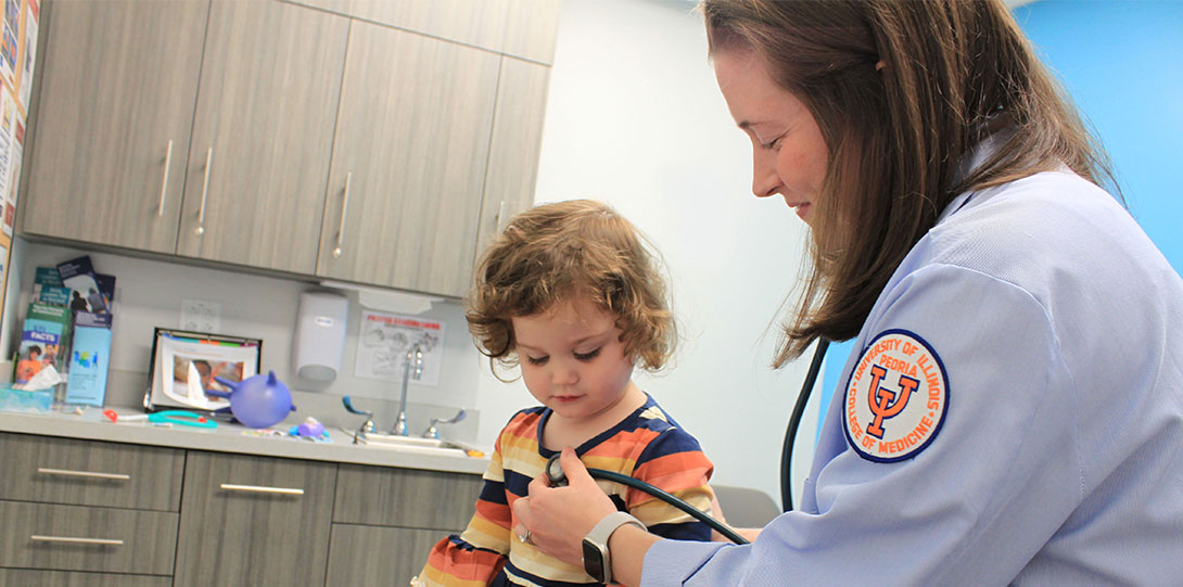 Pediatrics Resident Helps a Child Patient