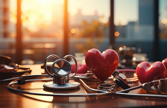 Ceramic Heart and Stethoscope on a Table