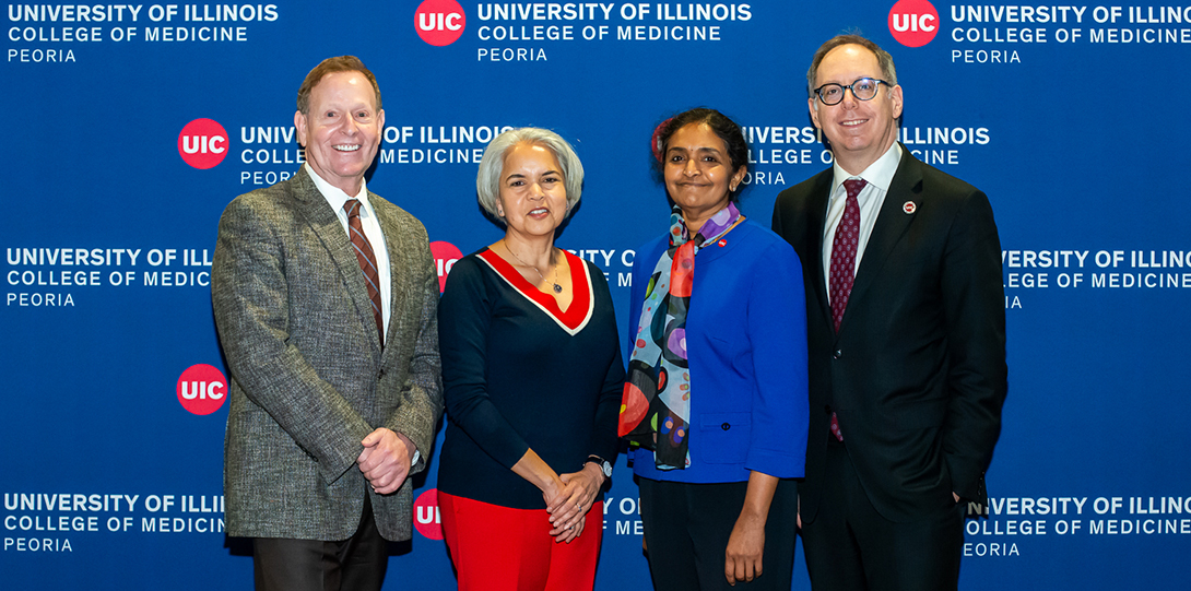UIC Chancellor Miranda stands with Peoria Regional Dean Dr. Aiyer and other leadership