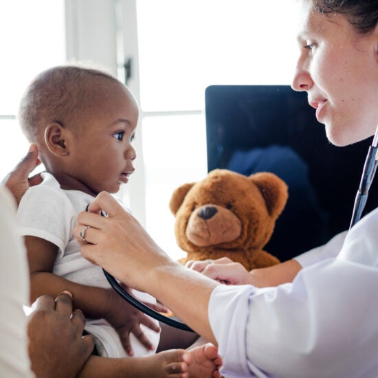 doctor treating a child patient