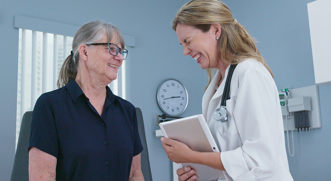 A doctor and patient share a laugh